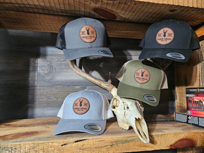 Frigid Forage Trucker Snapback hats with leather patch.     Heather/White